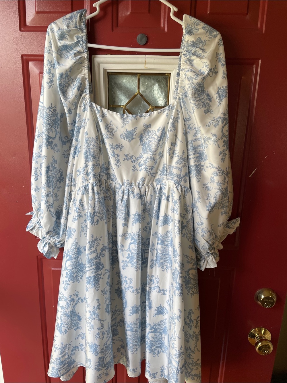 ARULA Blue and White Toile Puff Sleeve Dress
Sold By Alt”d State